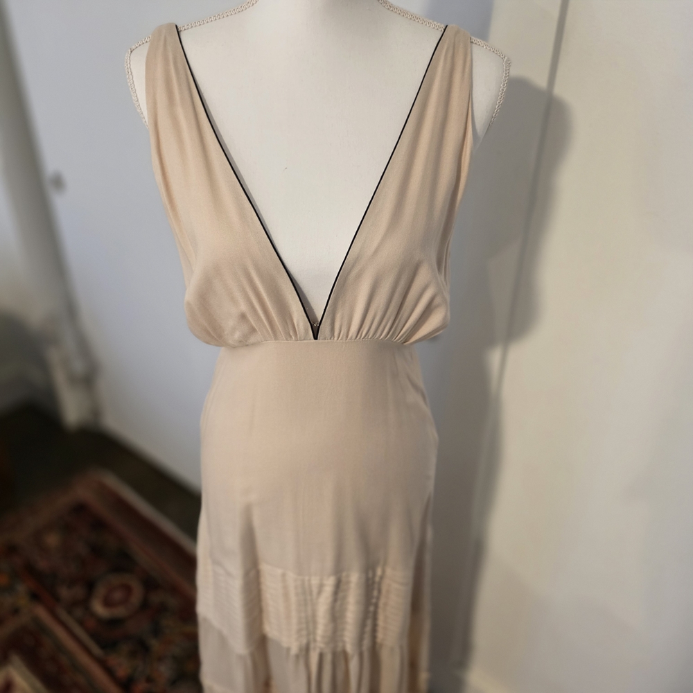 Aura Beige Fabric with Black Tag